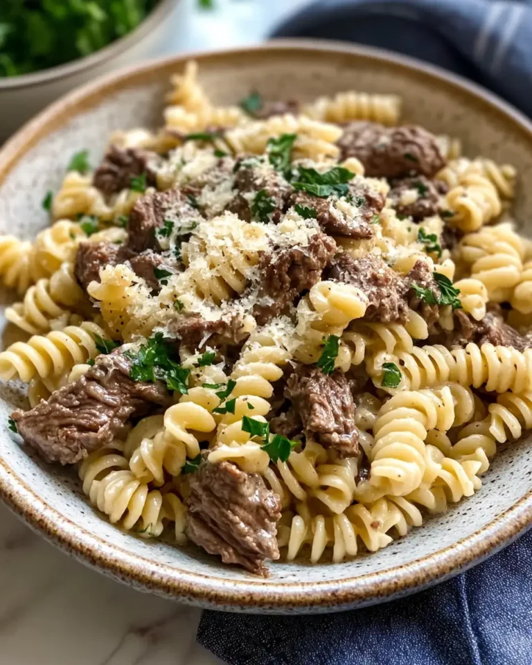 Indulge in Creamy Garlic Parmesan Rotini with Tender Beef Bliss - Featured Image