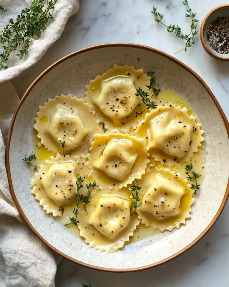 Indulge in the Irresistible Flavors of Creamy Tuscan Ravioli - Featured Image